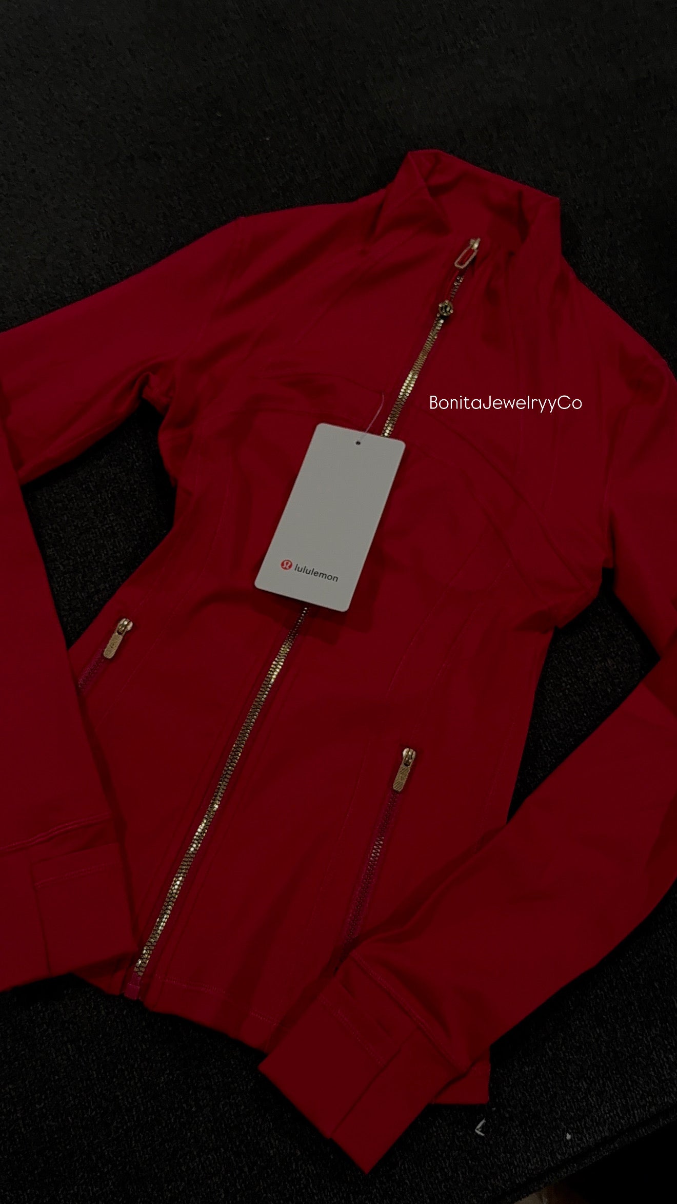Red Lulu with gold zipper