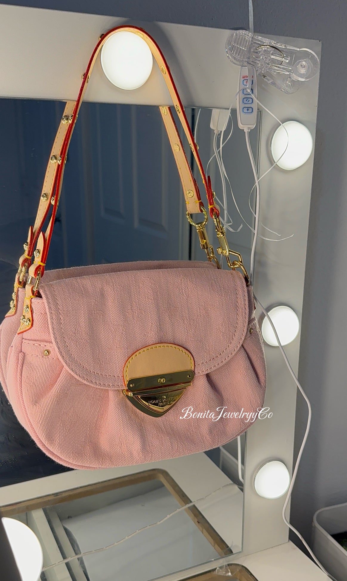 Pretty pink purse with brown straps