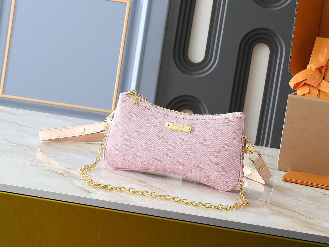 Pink monogram denim purse