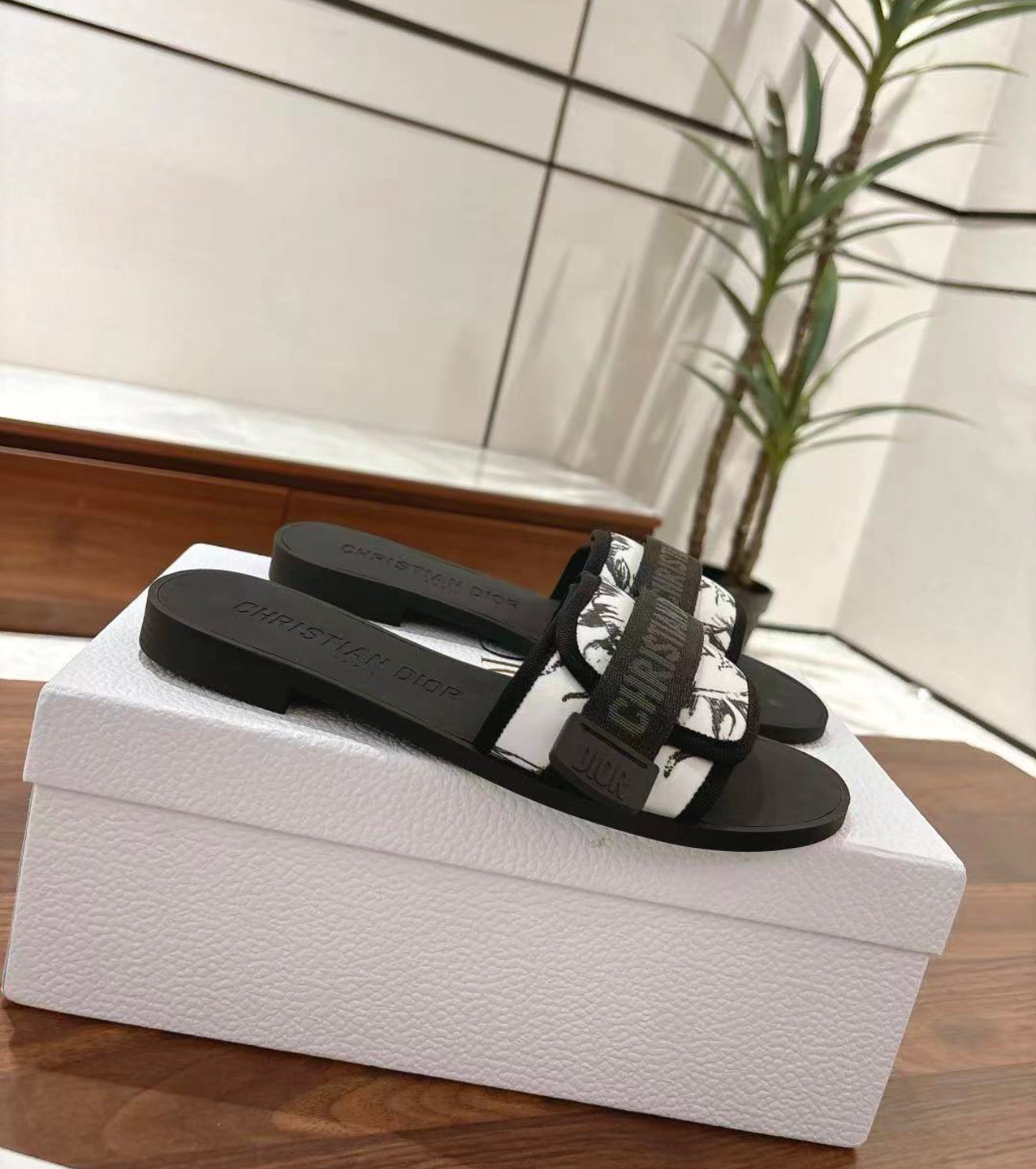 Woman’s slides with box
