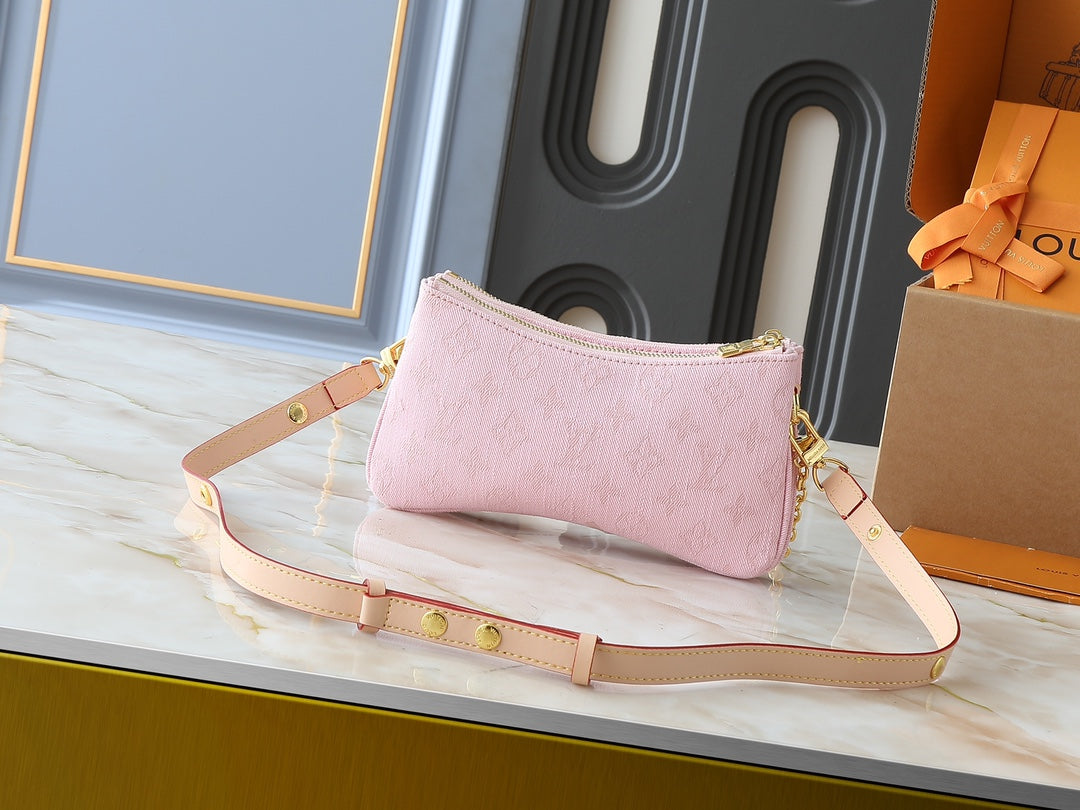 Pink monogram denim purse
