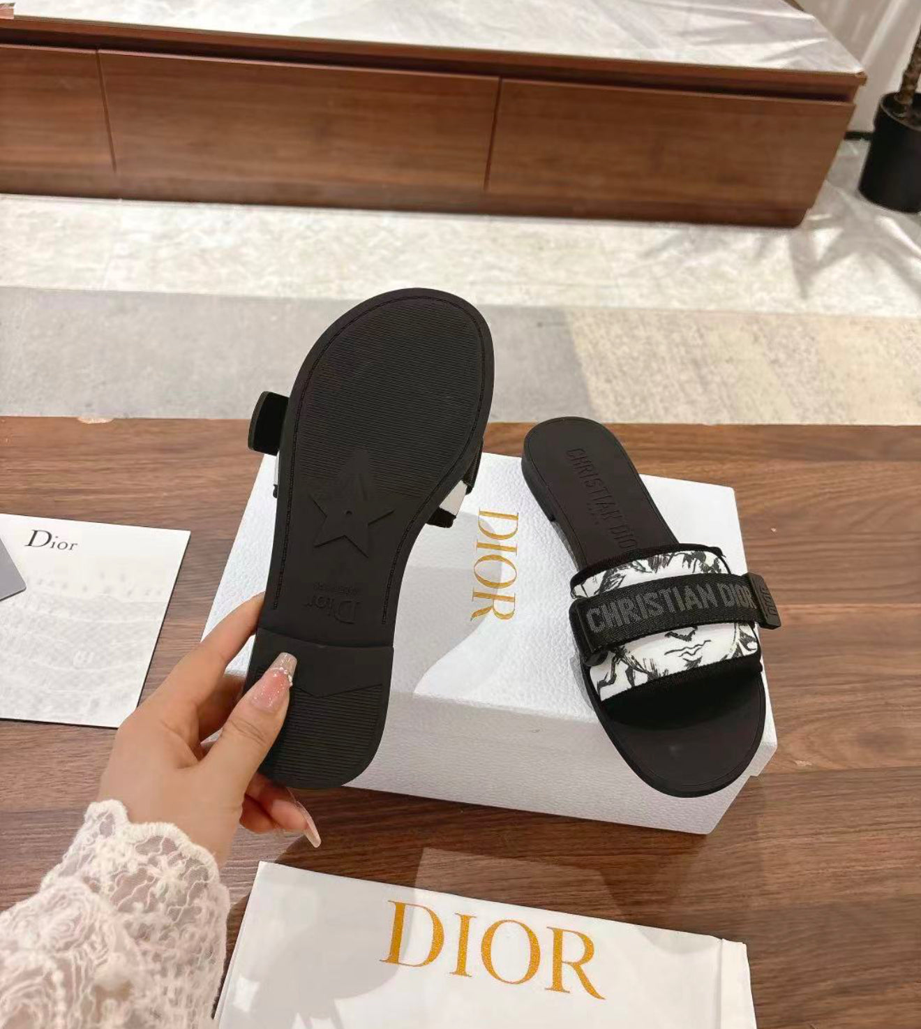 Woman’s slides with box