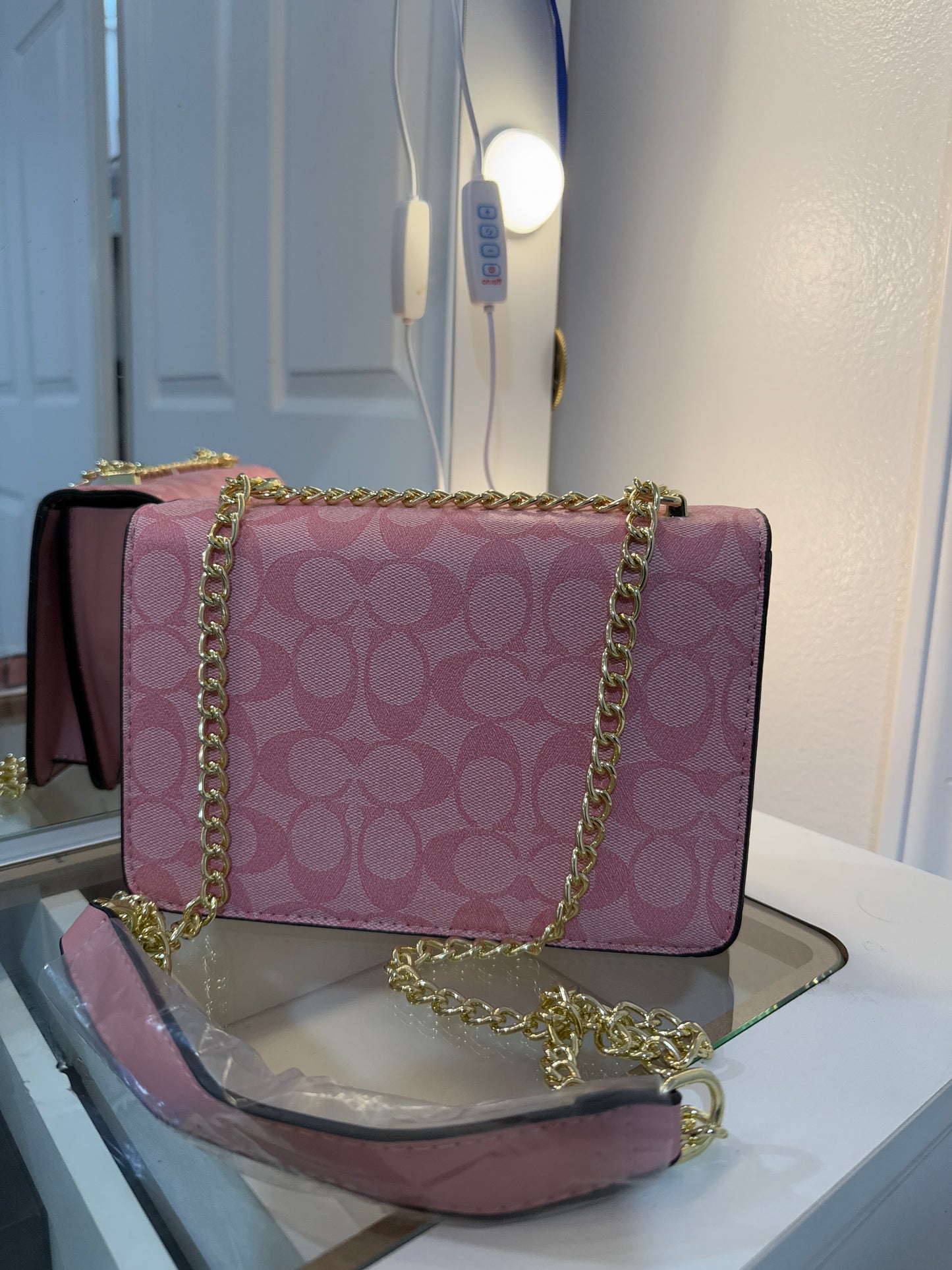 Pink cross body purse