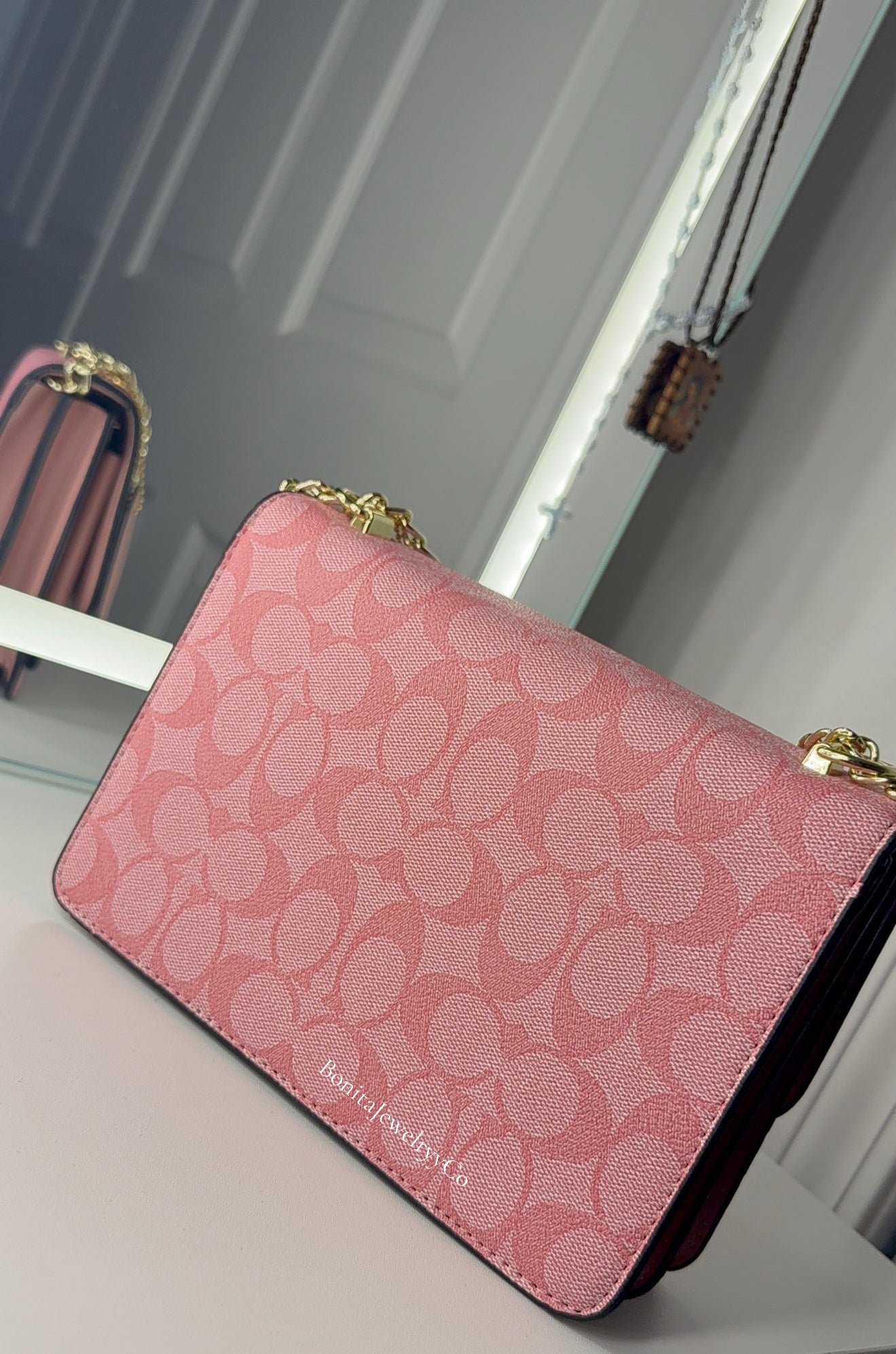 Pink cross body purse