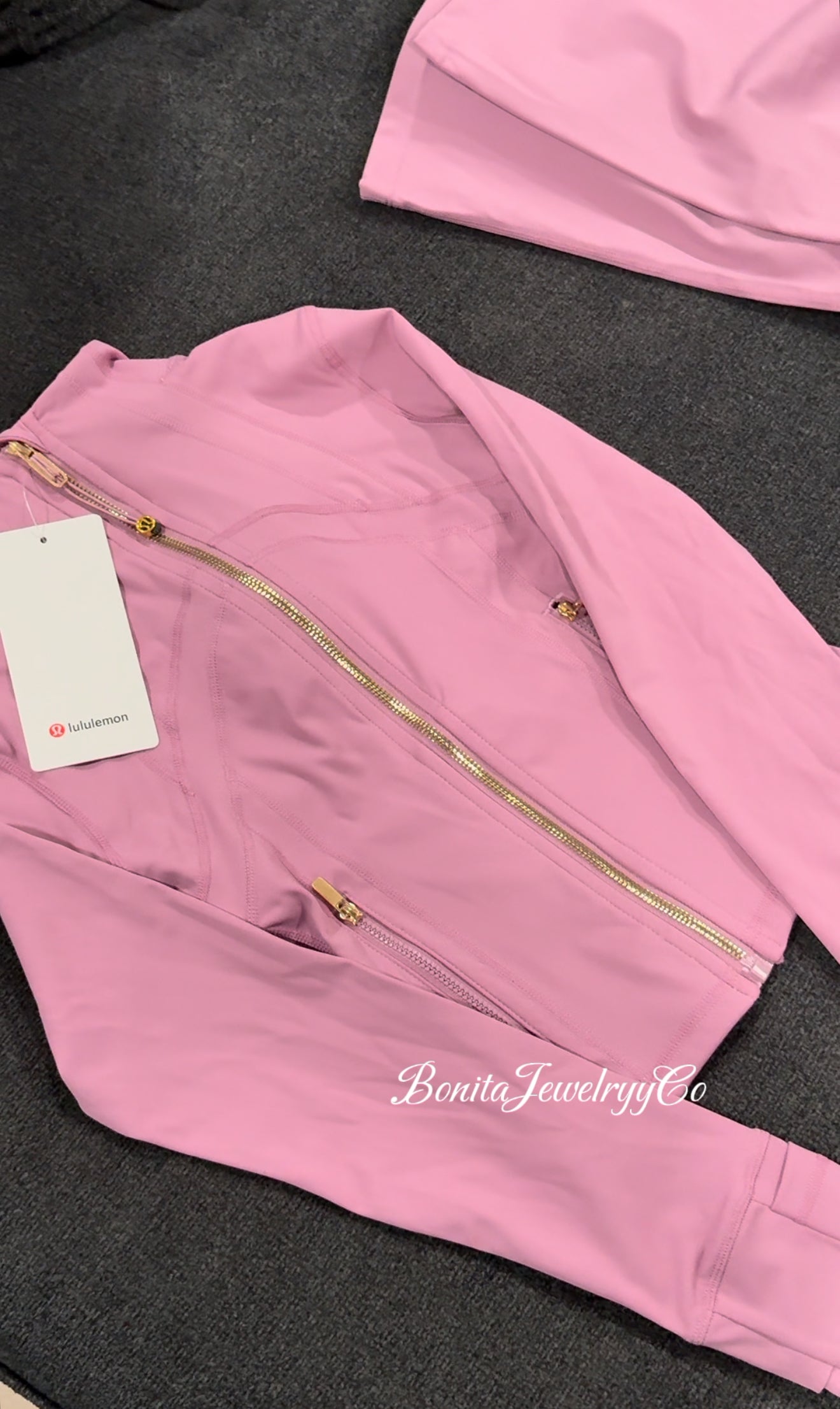 Purple pinkish cropped Lulu define jacket with gold zipper