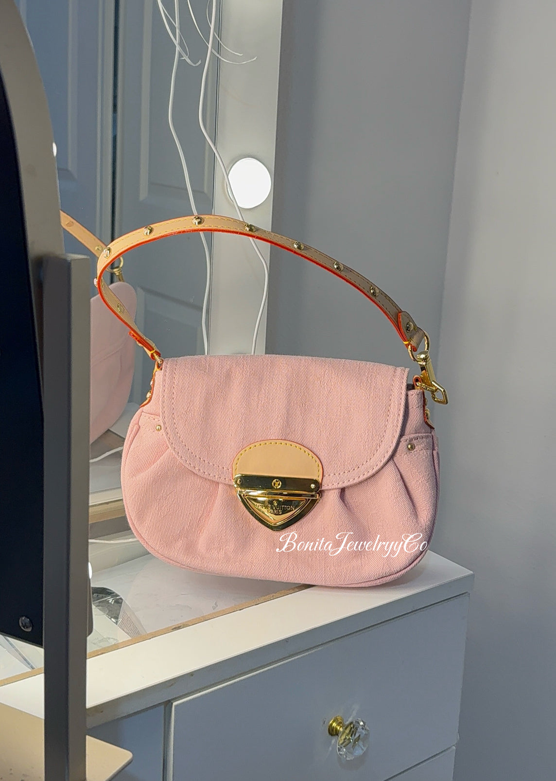 Pretty pink purse with brown straps