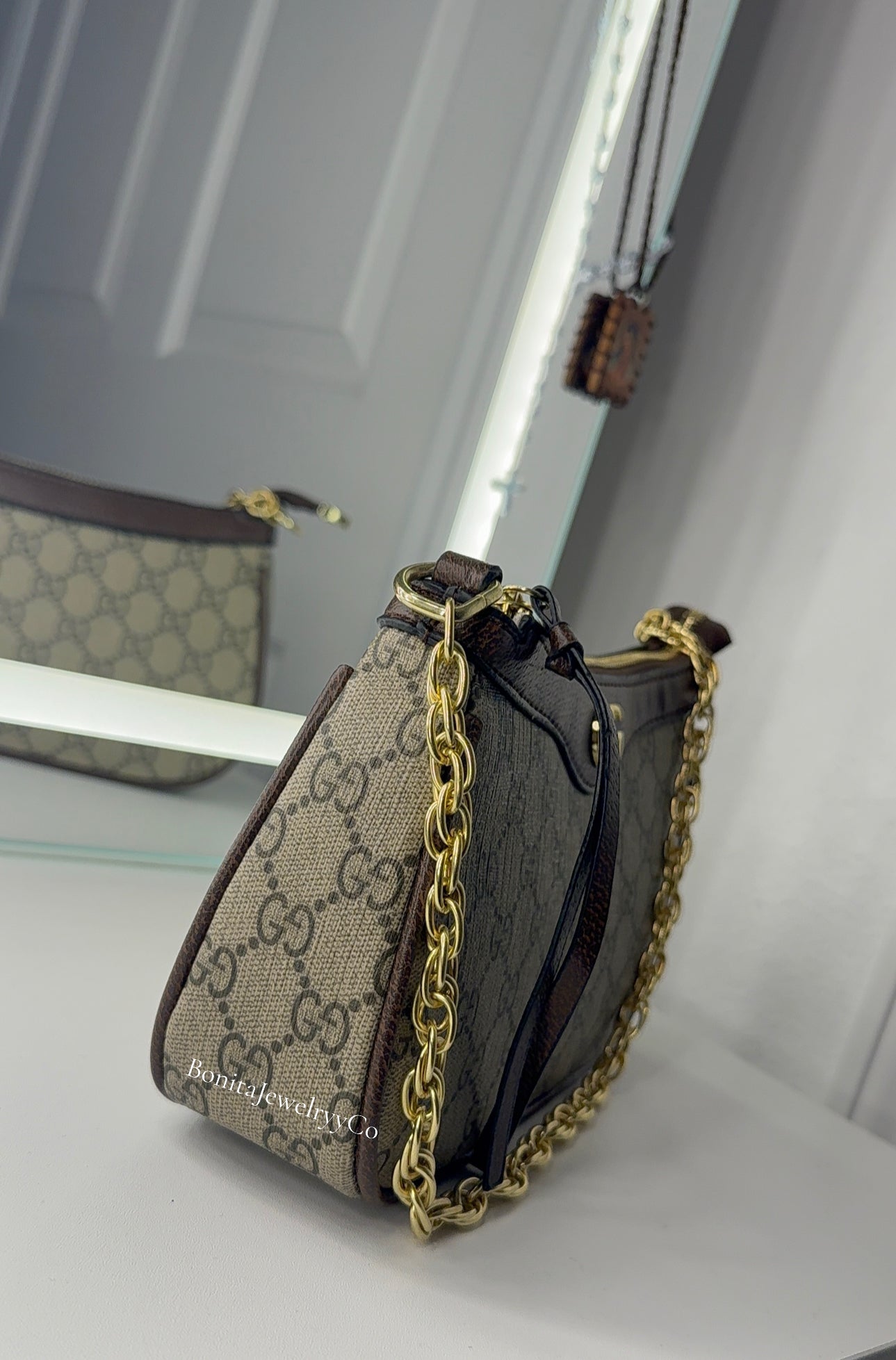 GG cross body purse