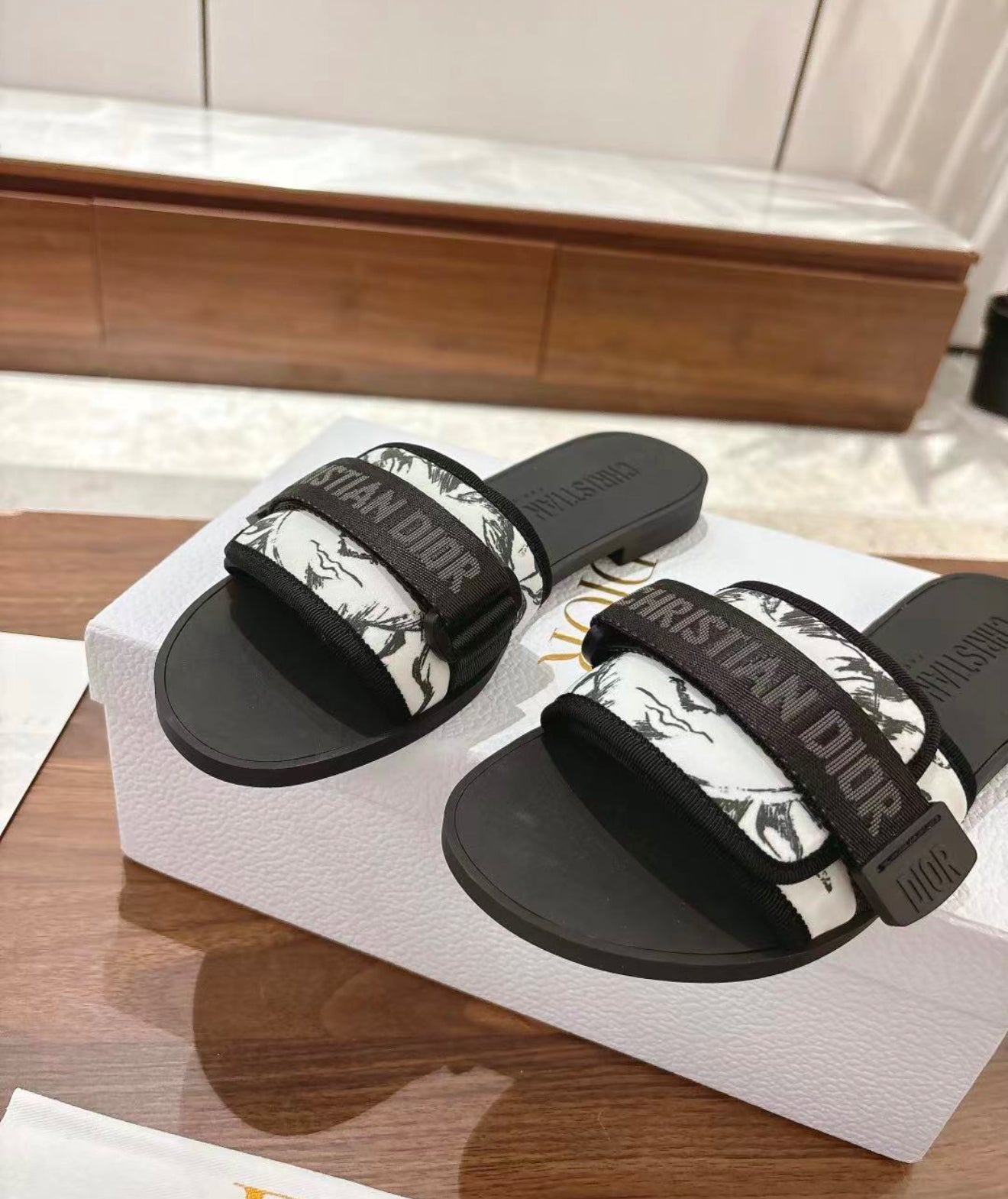 Woman’s slides with box