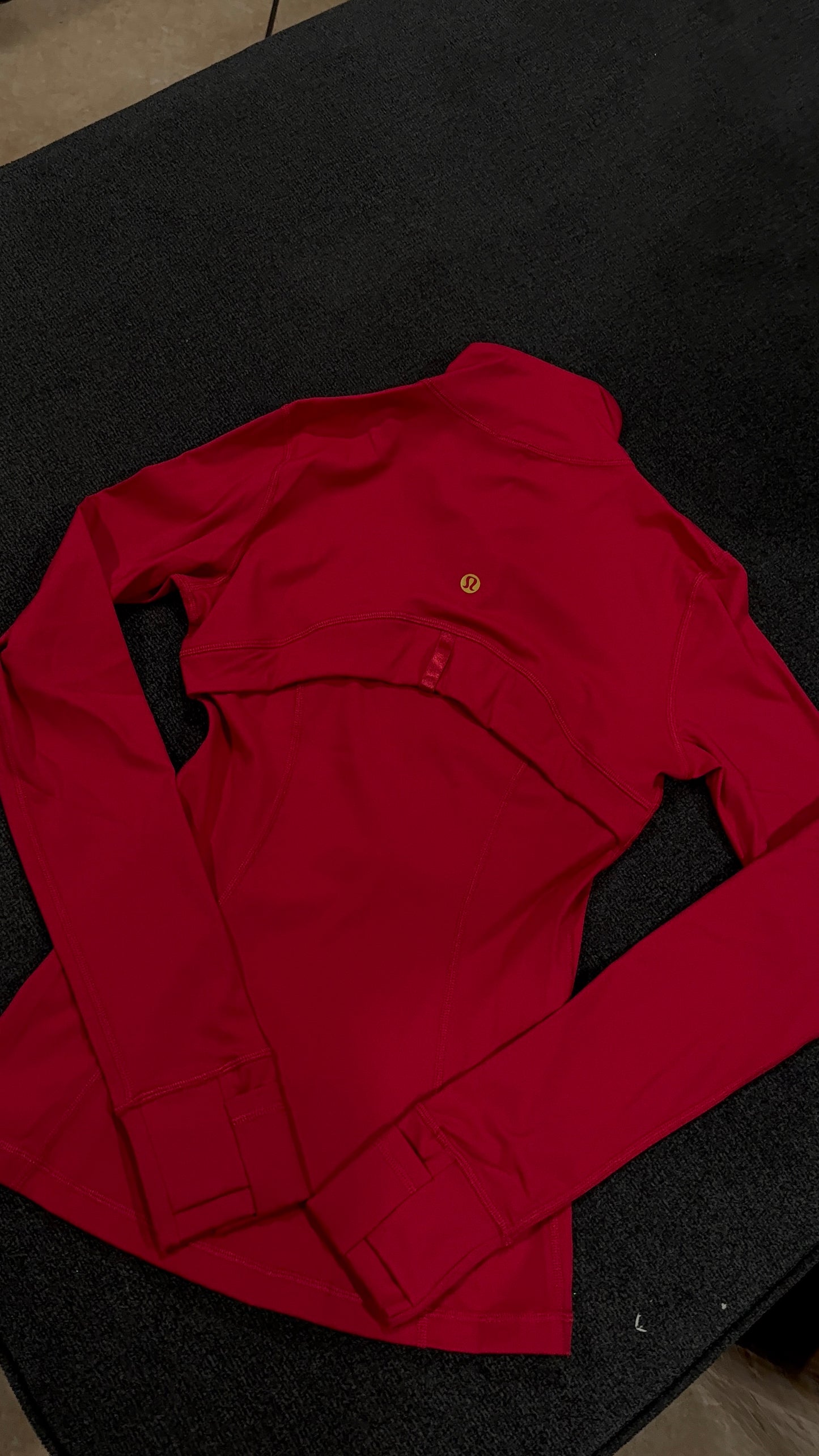 Red Lulu with gold zipper