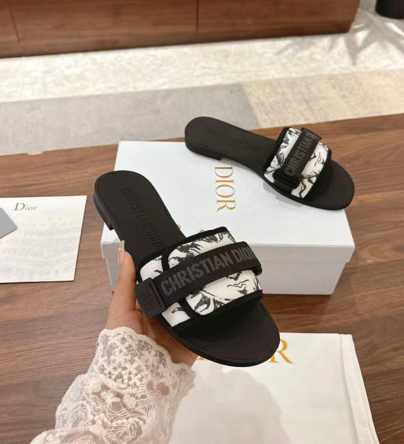 Woman’s slides with box