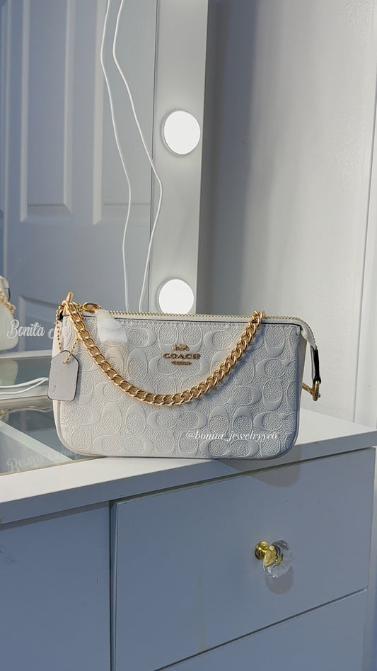 White bag with rose gold straps