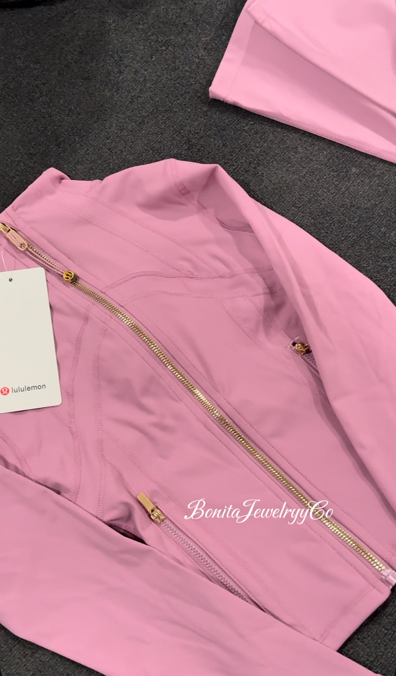 Purple pinkish cropped Lulu define jacket with gold zipper