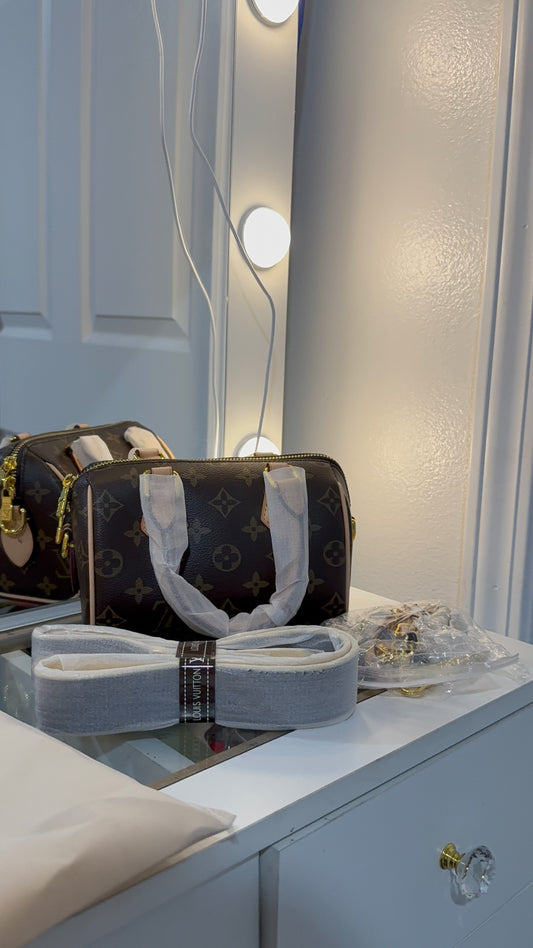 Brown monogram luxury hand bag