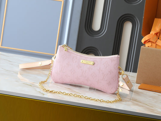 Pink monogram denim purse
