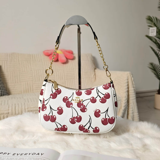 White purse with cherry 🍒