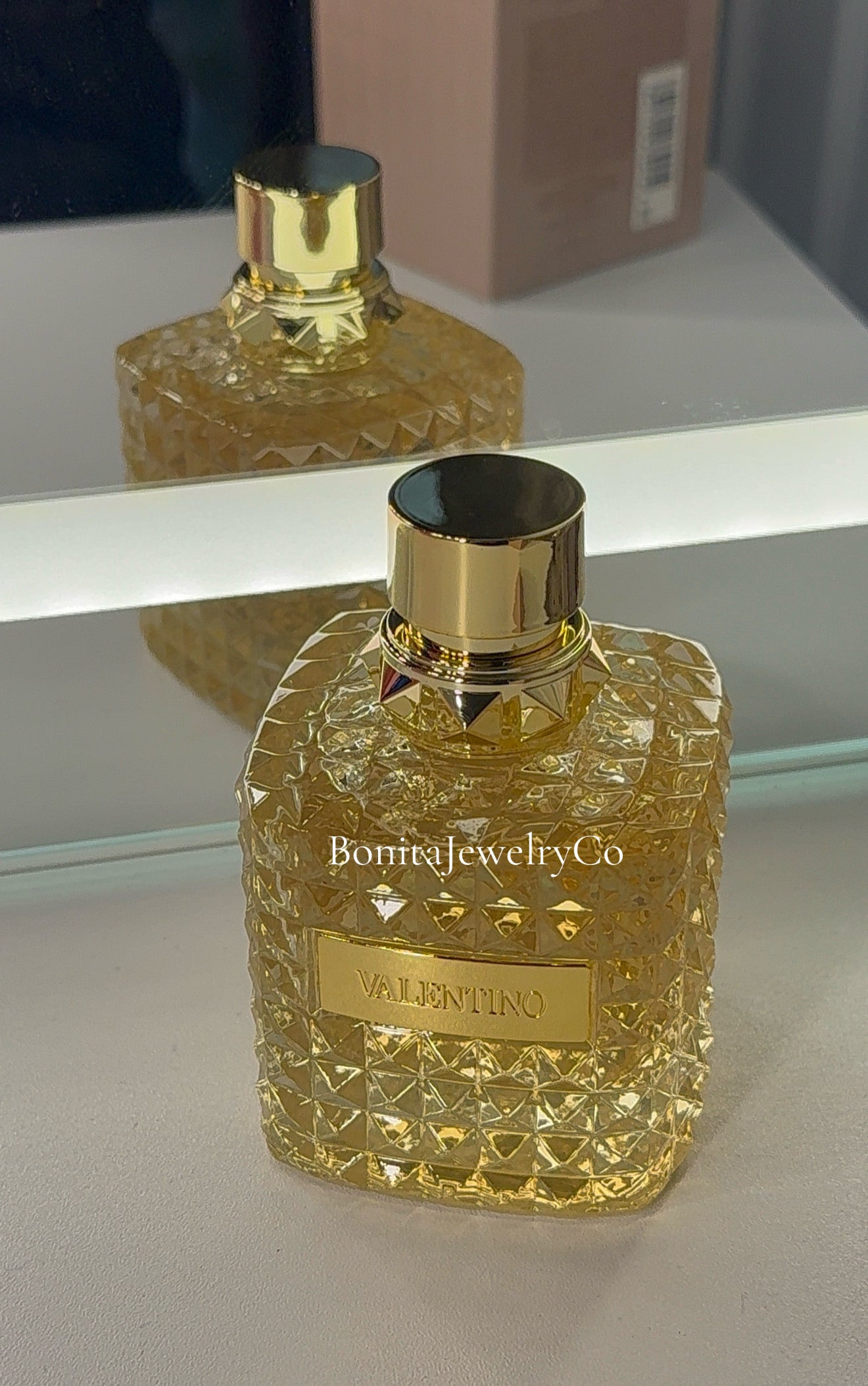 Gold woman’s perfume