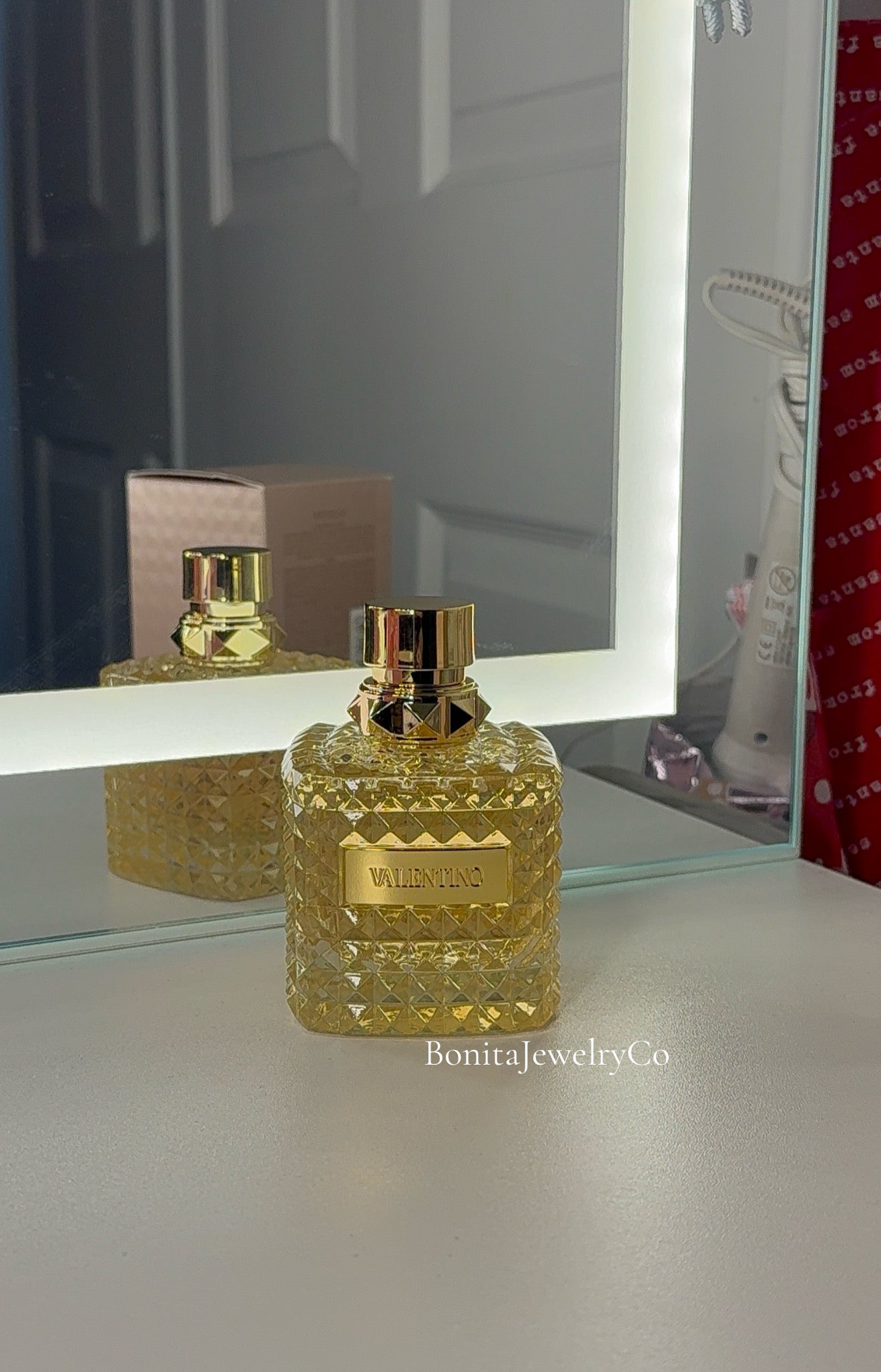 Gold woman’s perfume