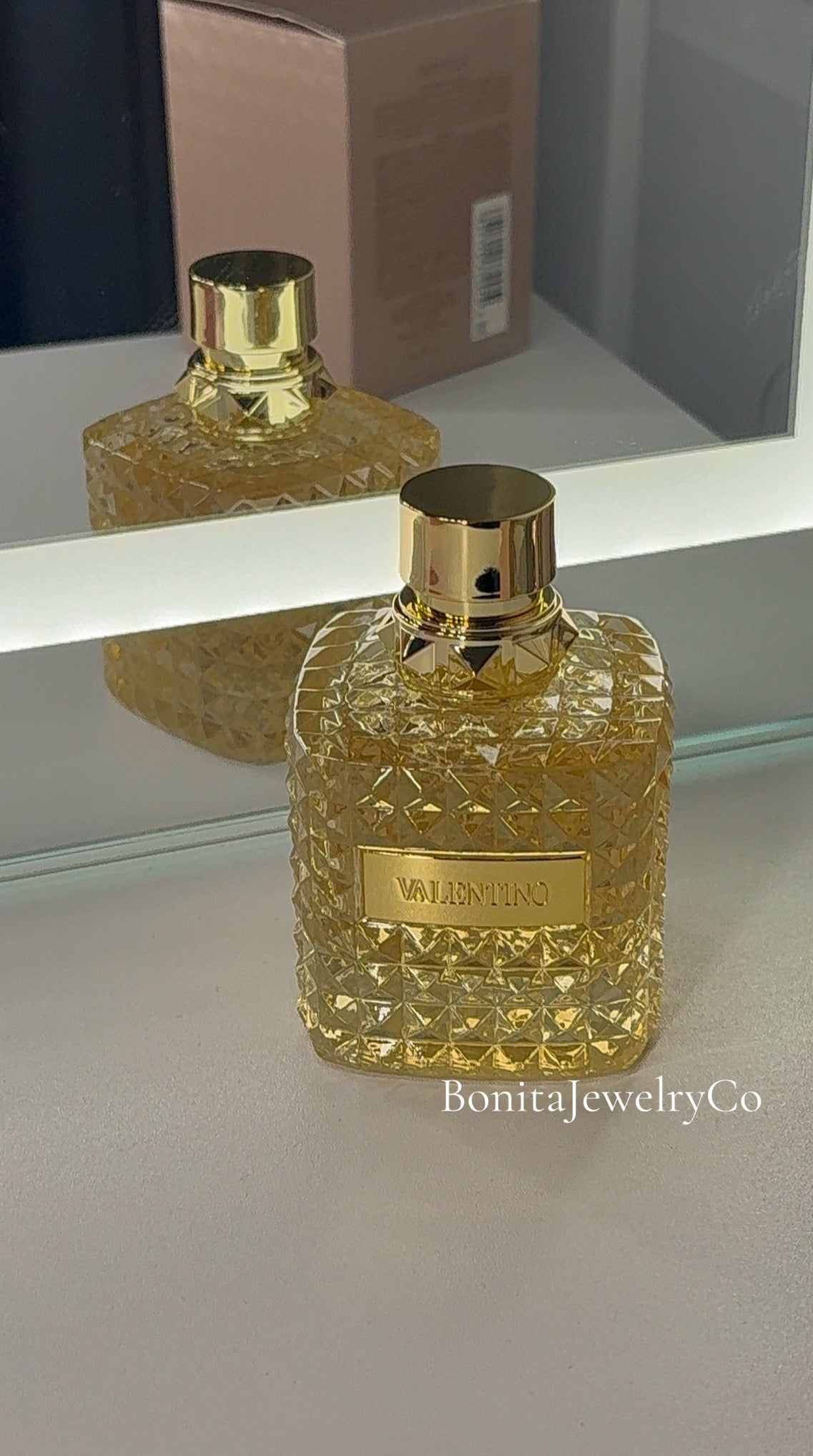 Gold woman’s perfume