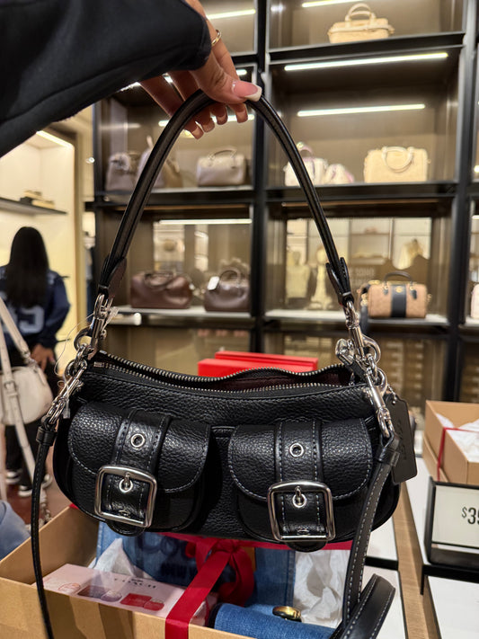Black purse with cross body strap