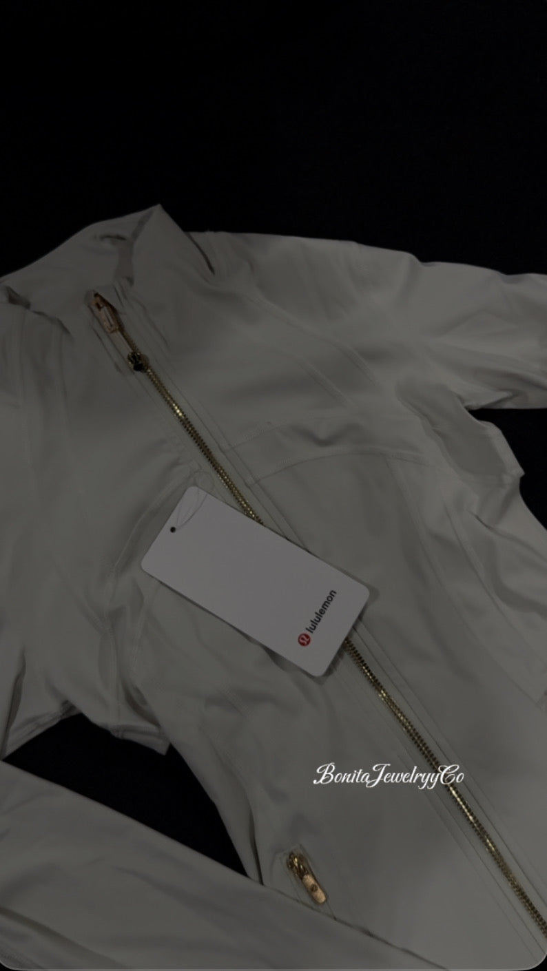 Milky white Lulu define jacket with gold zipper