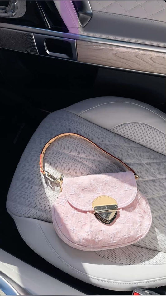Pretty pink purse with brown straps