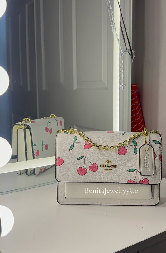 White cherry purse with gold strap