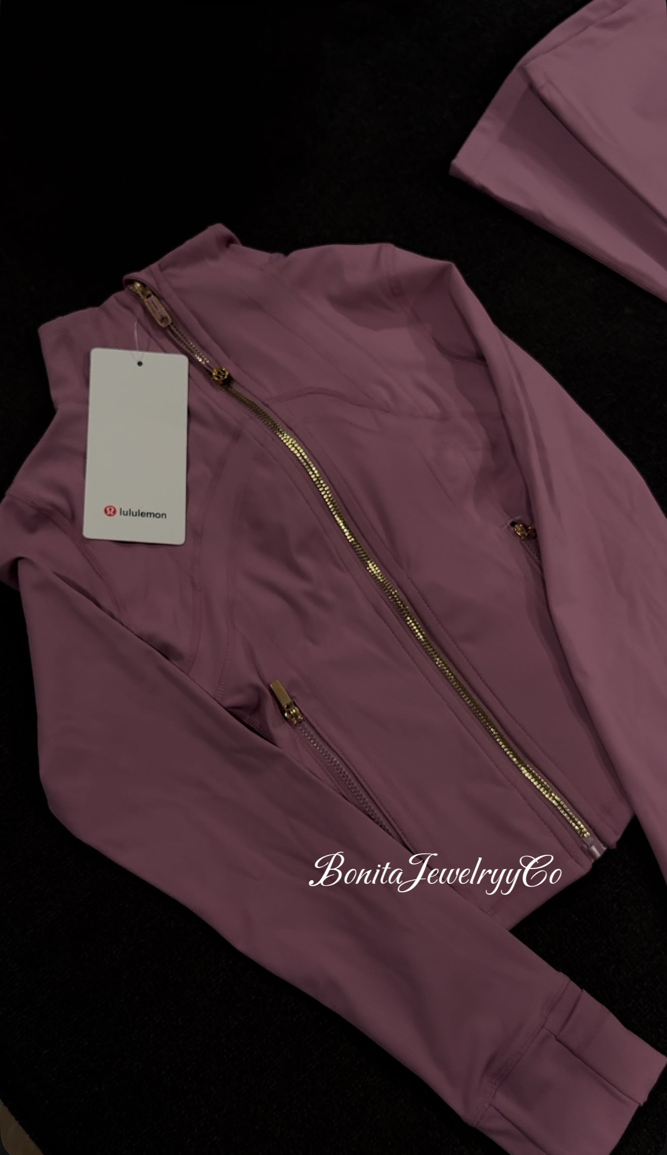 Purple pinkish cropped Lulu define jacket with gold zipper