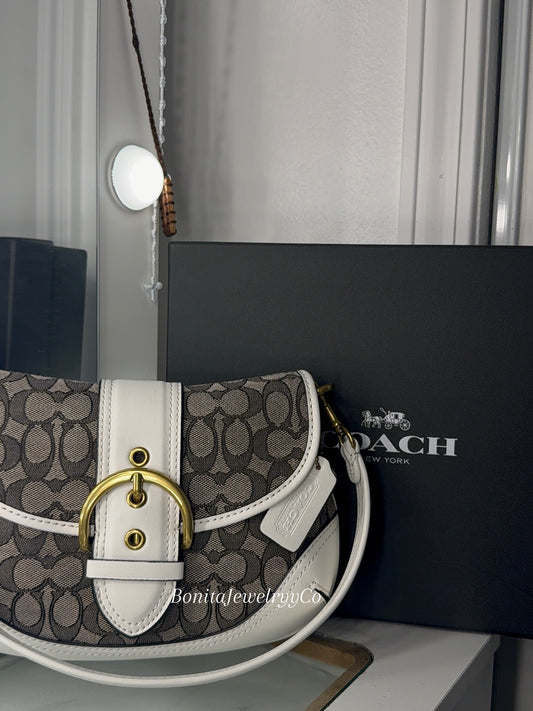 White vintage purse with cross body strap