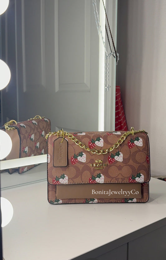 Brown strawberry purse with gold strap
