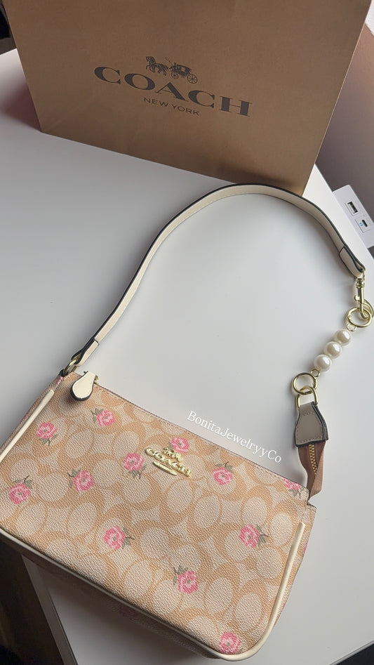 Floral purse with pearl extender