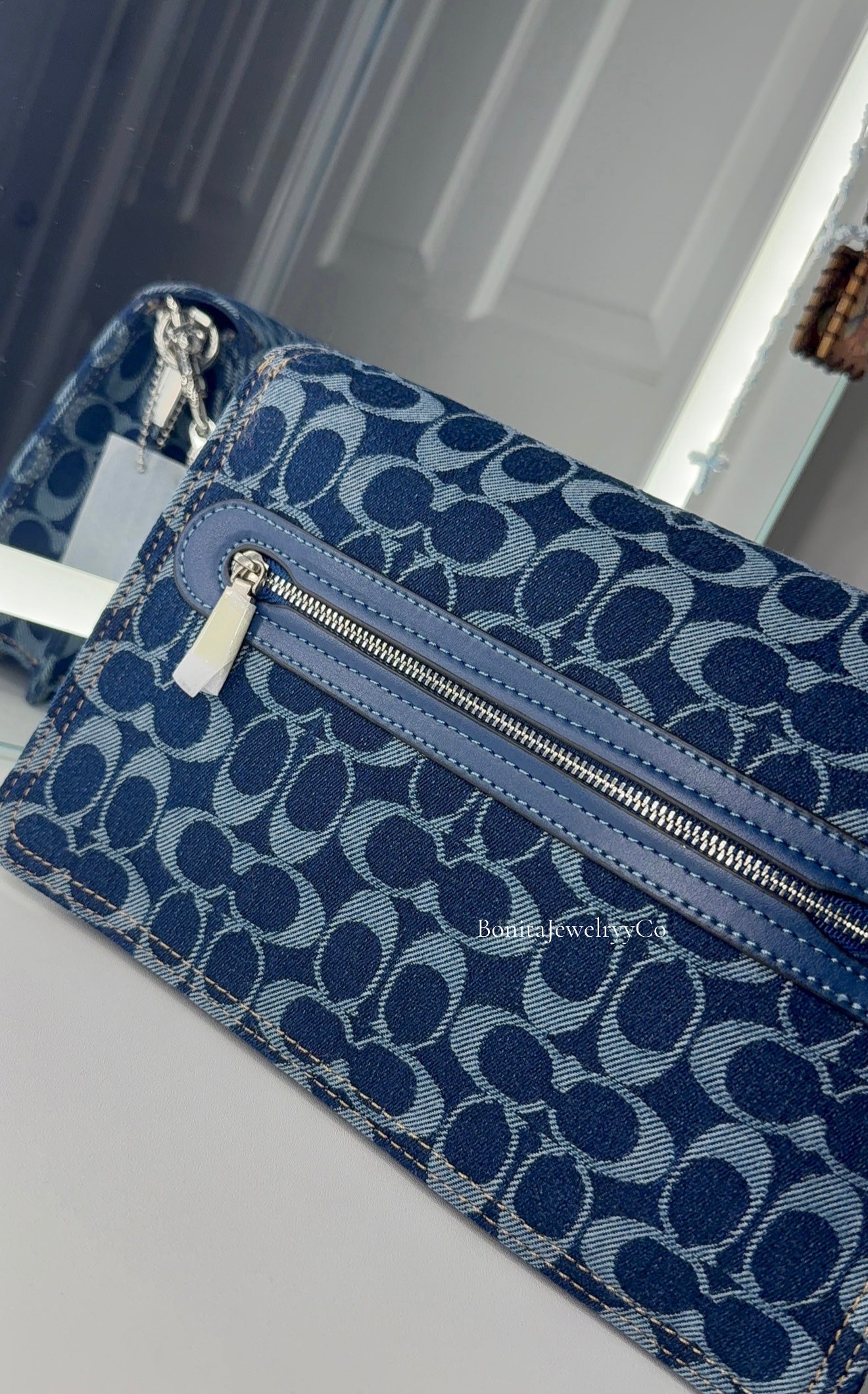 Blue Denim purse with silver wear
