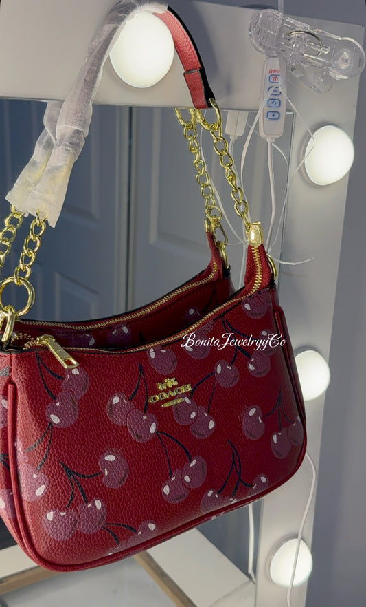 Red purse with cherry 🍒